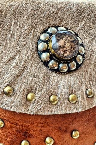Boho chic leather and stud handbag