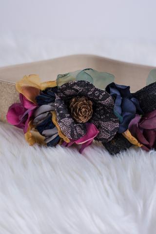 Flower belt with pine cones