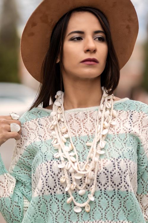 Necklace woven with shells